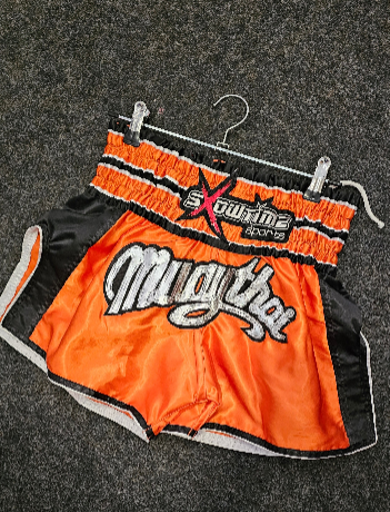 Sxowtime muay thai shorts orange kids