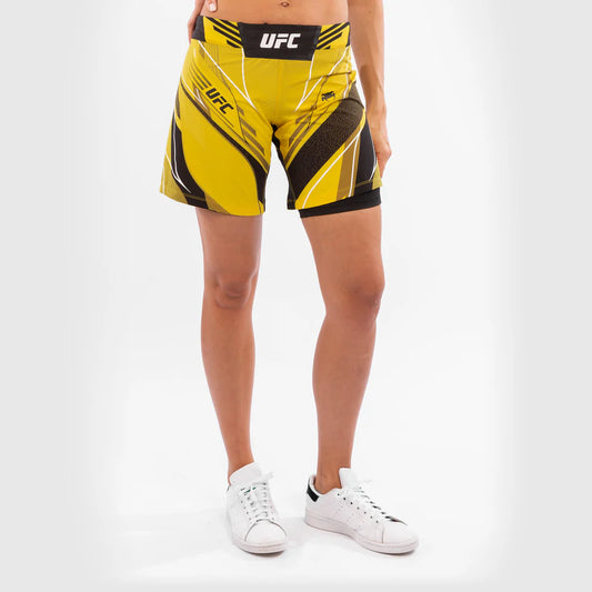 UFC by Venum Authentic Fight Night Damen Shorts - Long Fit - Gelb