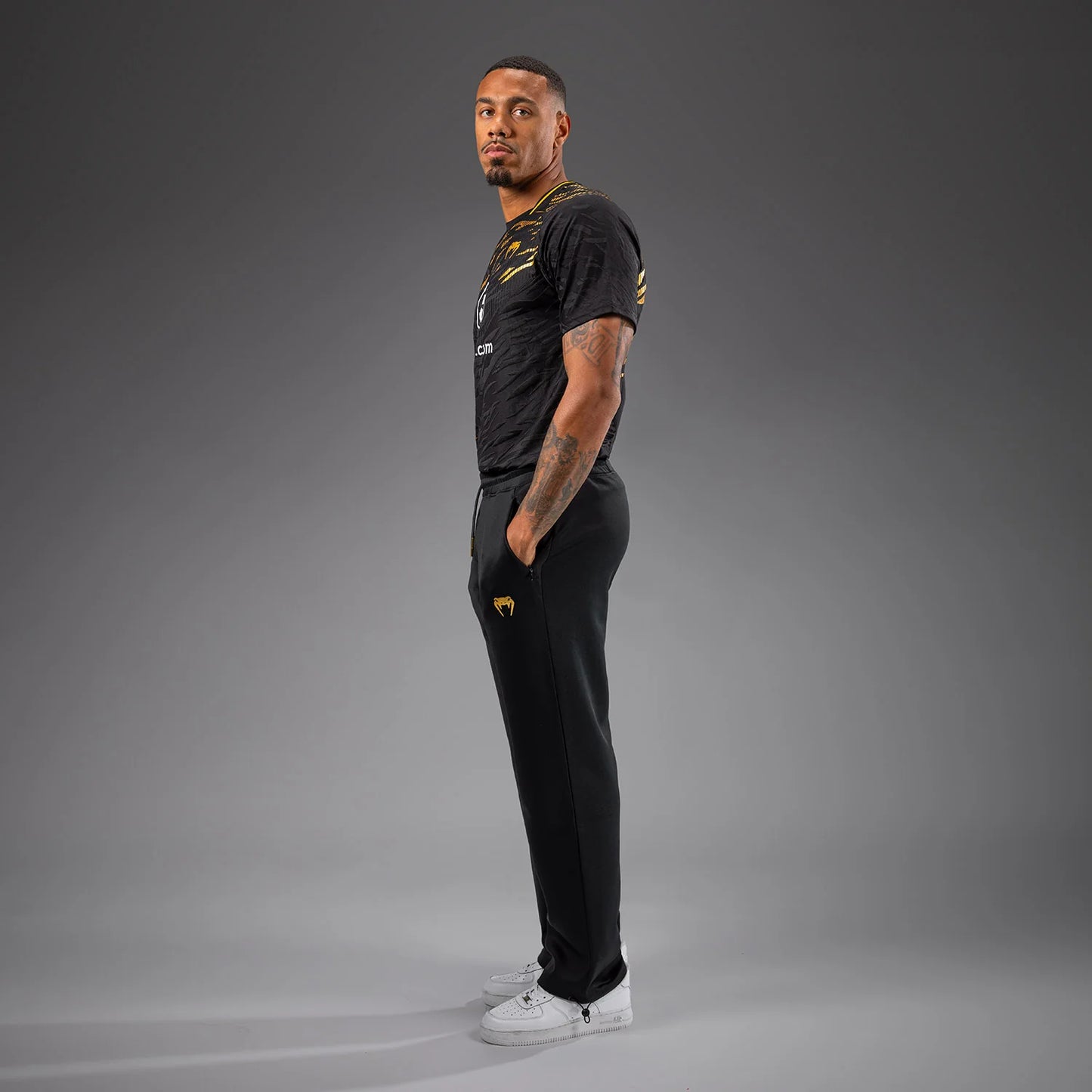 UFC Fusion by Venum Authentic Fight Night Herren Straight Leg Walkout Hose - Champion