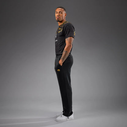 UFC Fusion by Venum Authentic Fight Night Herren Straight Leg Walkout Hose - Champion