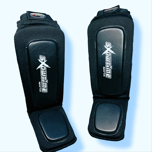 Showtime Schinenbein/Spannschützer Defender in Schwarz