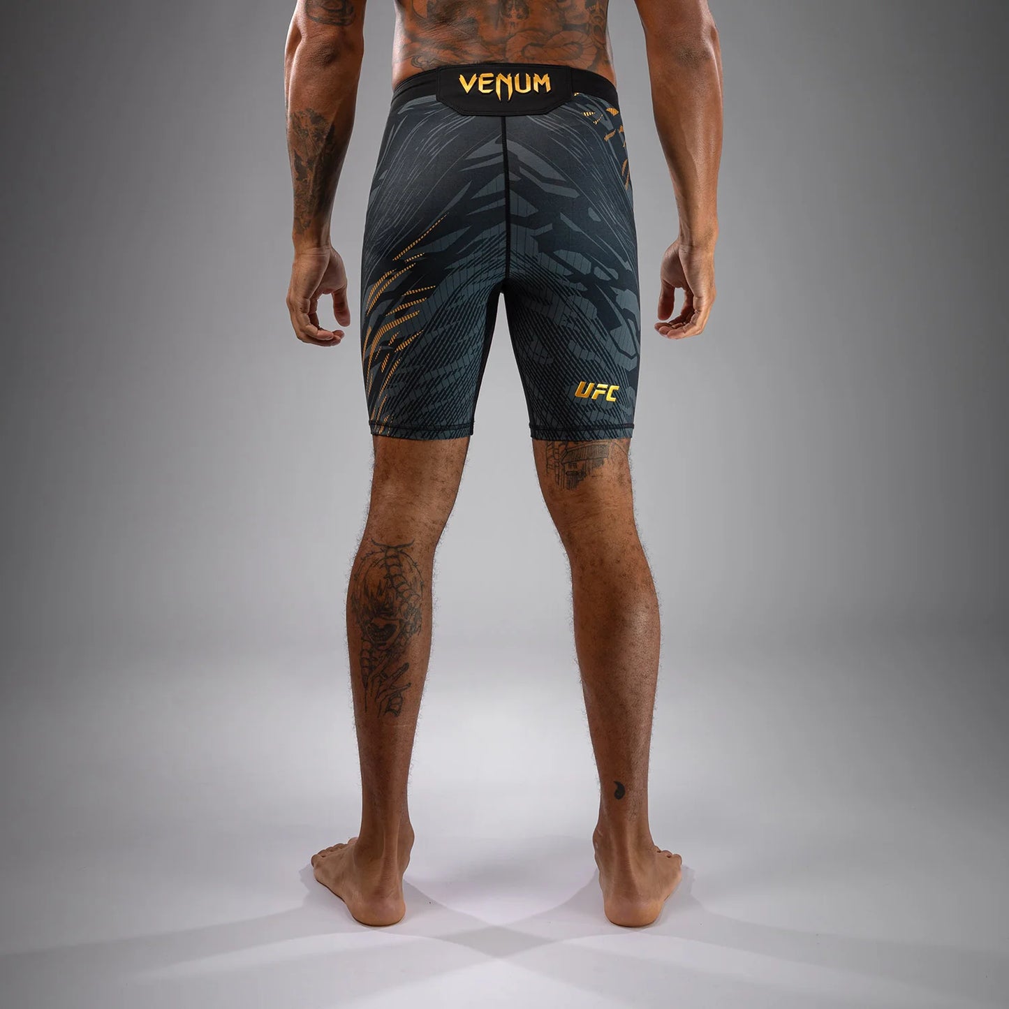 UFC Fusion by Venum Authentic Fight Night Herren Vale Tudo Short - Black/Gold